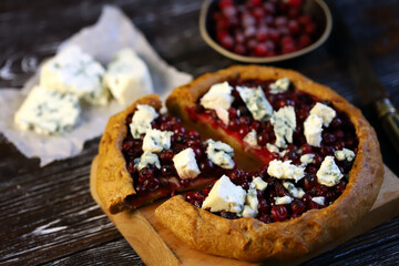 Homemade galette with cranberries and blue cheese.