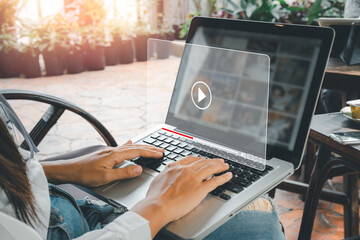 Video streaming on internet, Woman watching online movie or TV series on laptop computer, Concept...