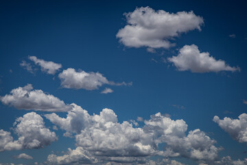 Naklejka na ściany i meble beautiful white clouds in a blue sky