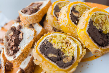 Turkish delight, pastille roll with sherbet and nuts. Sweet dessert. Soft focus