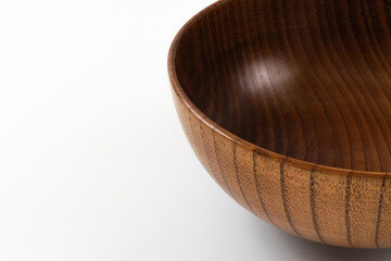 wooden bowl on a white background