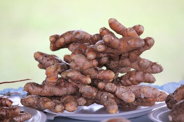 Freshly harvested taro root crop piled on a plate