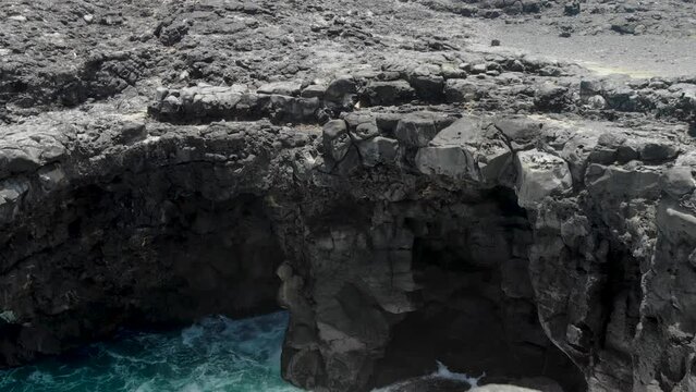 Aerial view on the coastline rock Pont Naturel in Mauritius