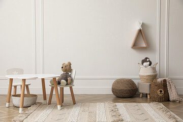 Cute child room interior with furniture, toys and wigwam shaped shelf on white wall