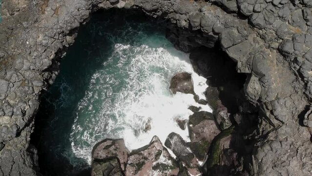 Aerial view on the coastline rock Pont Naturel in Mauritius