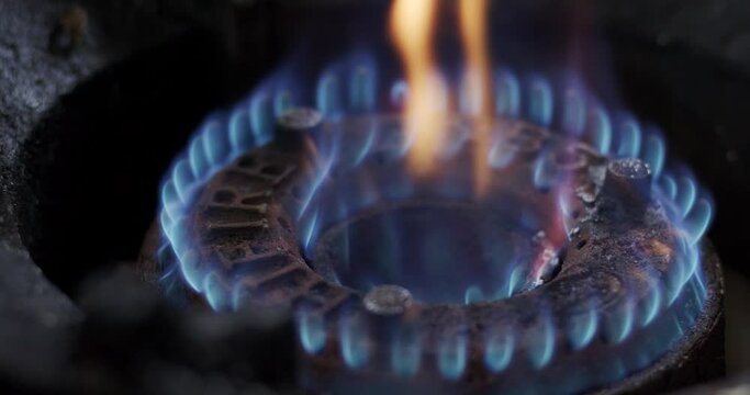 Light a fire on the stove to cook. Layers and color of fire around the stove after being igniting.