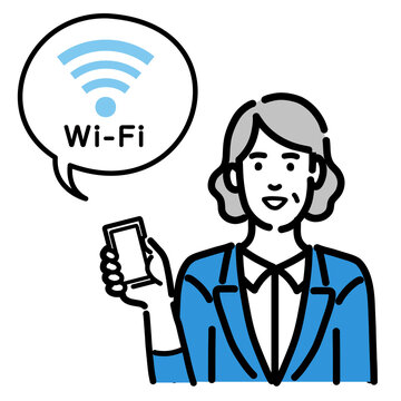 スマートフォンを持ってWi-Fiの説明をしているスーツを着たシニアの女性
