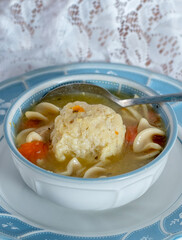 Grandmas chicken soup with matzo balls, a delicious jewish food
