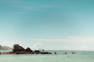 The sloping Kute Beach in Lombok, with its calm waters, is the main attraction of Lombok island tourism, West Nusa Tenggara, Indonesia.