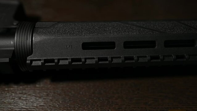 fast close-up of an AR-15 assault rifle upper receiver