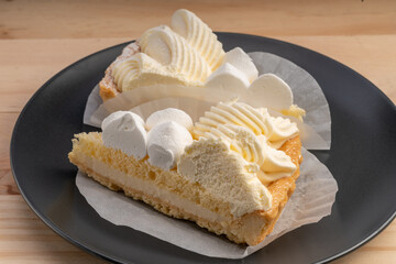 Tiramisu cake originated from Italy.Tiramisu cake with pie and white cream topping . 