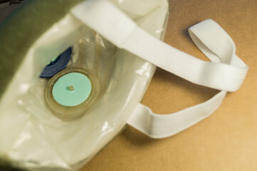 Construction respirator. Inner part with petal valves. Protective mask for filtering the inhaled air from dust. Selective focus