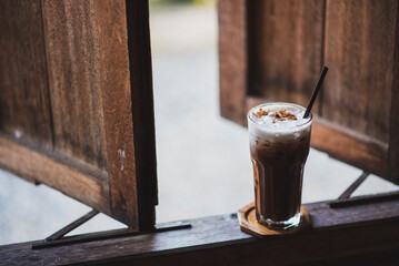 cup of coffee on wooden table