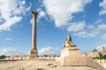 The famous Pompey pillar with sphinx in the Upper Egyptian city of Alexandria. A popular travel...