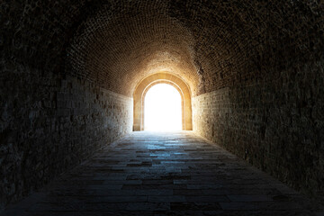 light at the end of the tunnel. dark tunnel in the catacomb