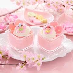 Cherry blossom mousse dessert with whipped cream in glasses. Home made spring glass dessert for Japanese Doll's Festival . おひな祭り　ひな祭り　さくらババロア　さくらプリン