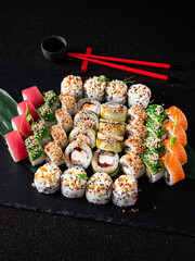 tasty sushi on the black background