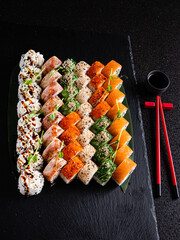 tasty sushi on the black background
