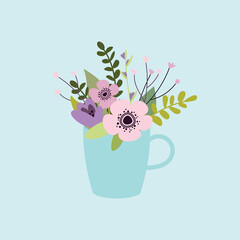 Blue cup of pink and purple anemones, purple tulip,branches and plants on blue background