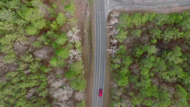 Top Down Aerial Shot of a Jeep on a Rural Highway