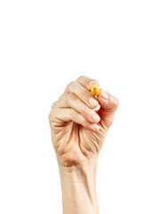 Close-up Female hand writing with a pen, yellow pen in hand, isolated on white background