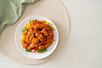 fried crispy chicken with sweet and sour sauce