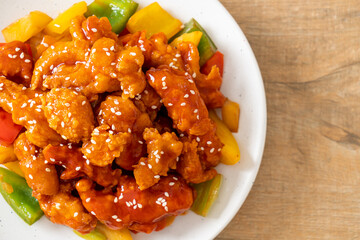 fried crispy chicken with sweet and sour sauce