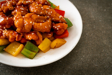 fried crispy chicken with sweet and sour sauce