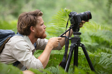 a photographer with his camera
