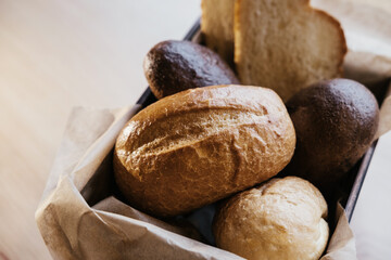Appetising Bread buns in box on the table
