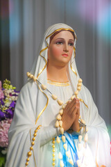 Fototapeta na wymiar Our Lady of Lourdes Catholic religious statue