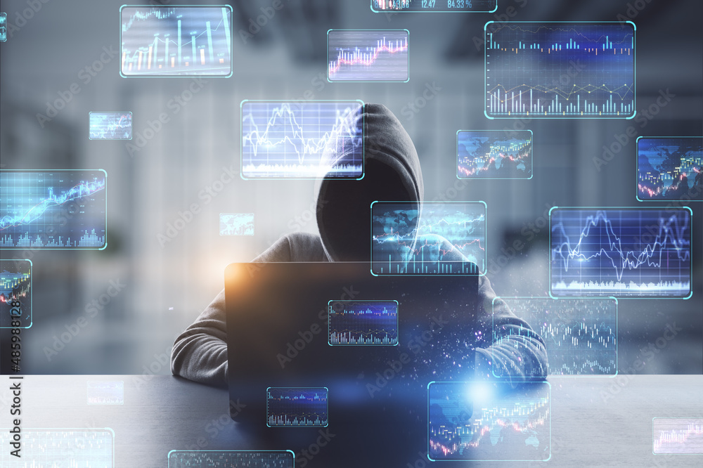 Poster hacker at desktop using laptop with various forex screens on blurry office interior background. cryp