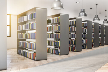 Side view on book shelves in modern library interior with chrome lamps on top, wooden and concrete floor and light ceiling. 3D rendering