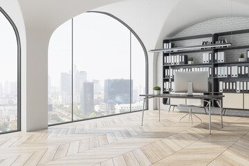 Bright office interior with designer desktop and computer, bookcase with folders, window with city view, wooden flooring and daylight. 3D Rendering.