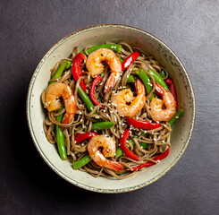 Soba noodles with shrimp, pepper and green beans. Japanese cuisine. Asian food.