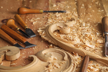Wood processing. Joinery work. Wood carving. Chisels for carving on the woodworker desk