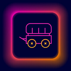 Glowing neon line Wild west covered wagon icon isolated on black background. Colorful outline concept. Vector
