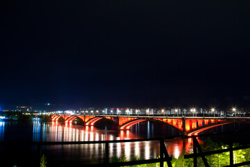 Fototapeta na wymiar Siberian bridge over river