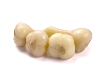 Canned garlic, isolated on white. Pickled garlic.