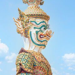 Naklejka premium Guardian Statue at Emerald Buddha temple in Grand Palace of Bangkok