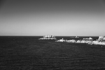 Distant view of lighthouse on sea
