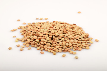 Green lentils isolated on white background.