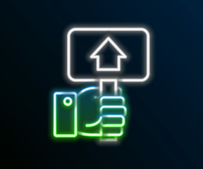 Glowing neon line Hand holding auction paddle icon isolated on black background. Bidding concept. Auction competition. Hands rising signs with BID inscriptions. Colorful outline concept. Vector