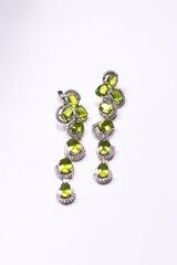 Diamond design earrings isolated on a white background.