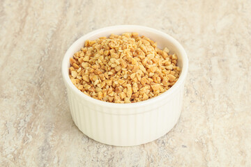 Crunched roasted peanut in the bowl