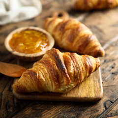 Homemade croissants with orange marmalade