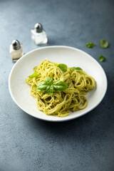 Traditional spaghetti with pesto sauce