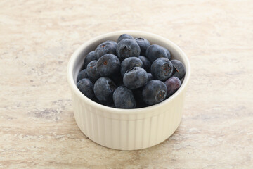 Sweet ripe blueberry heap in the bowl