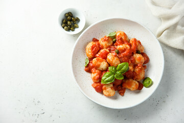 Homemade gnocchi with tomato sauce