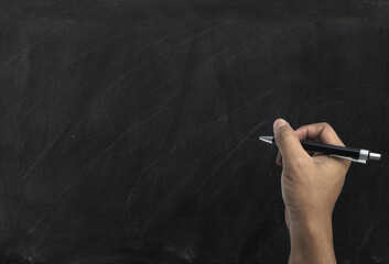 Hand writing with chalk on blackboard business and school or strategy concept design ,white chalk to write something on black board for time line cover or website background, with copy space for text.